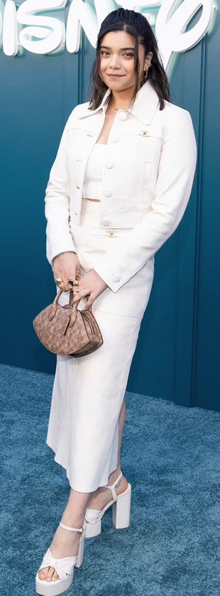 white skirt, denim jacket, and beige handbag?