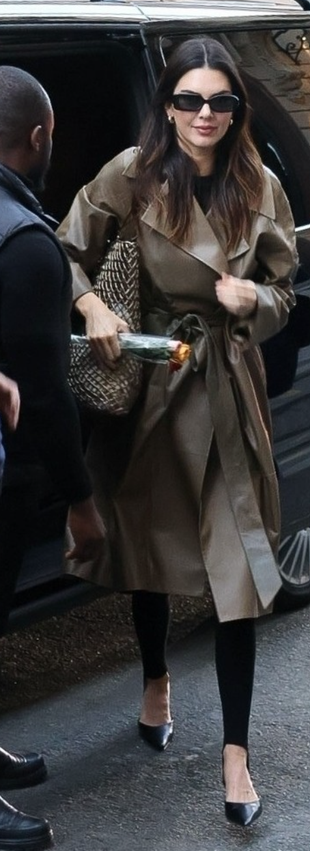 brown leather jacket, handbag, and gold jewelry?