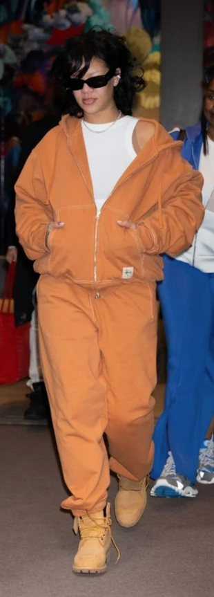 beige boots, orange sweatpants and hoodie?