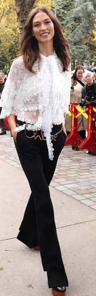 platform boots, black pants, and white lace top?