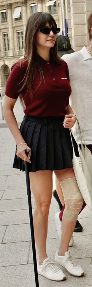 red polo shirt, black pleated skirt, and sneakers?