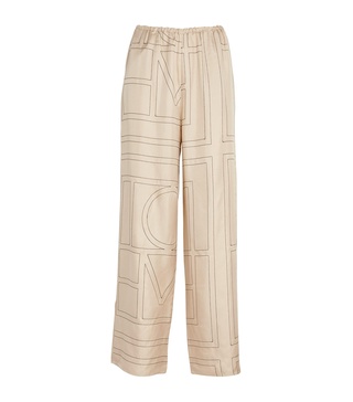 Monogram embroidered silk pants