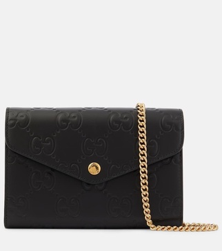 GG debossed leather wallet on chain