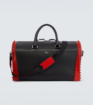 Sneakender spiked leather duffel bag