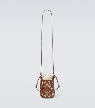 Anagram leather-trimmed canvas bucket bag