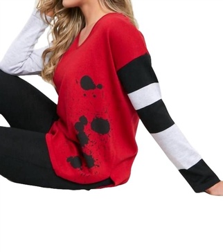 stripe sleeve splatter v-neck sweater in fire