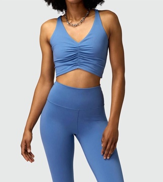 everly twist back sports bra in pacific blue