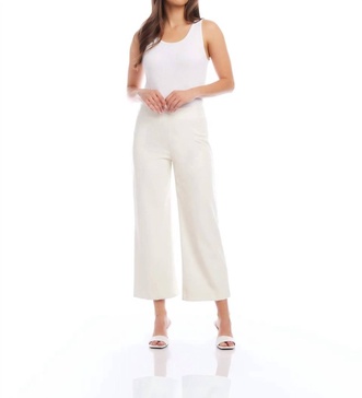 faux leather cropped pants in off white