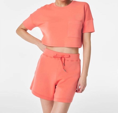 airessentials cropped pocket tee in sunset peach