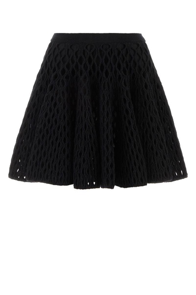 Black mesh mini skirt