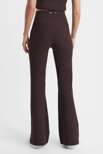 The Upside High Rise Flared Leggings in Brown