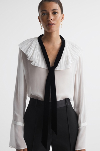 Sheer Ruffle Velvet Tie-Neck Blouse in Cream/Black