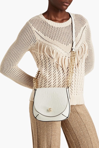 Embossed leather cross-body bag