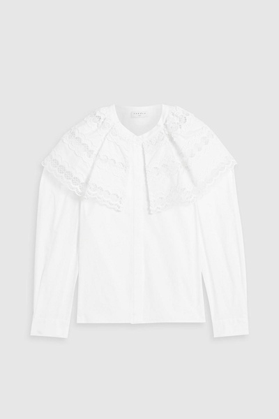 Ruffled broderie anglaise cotton blouse