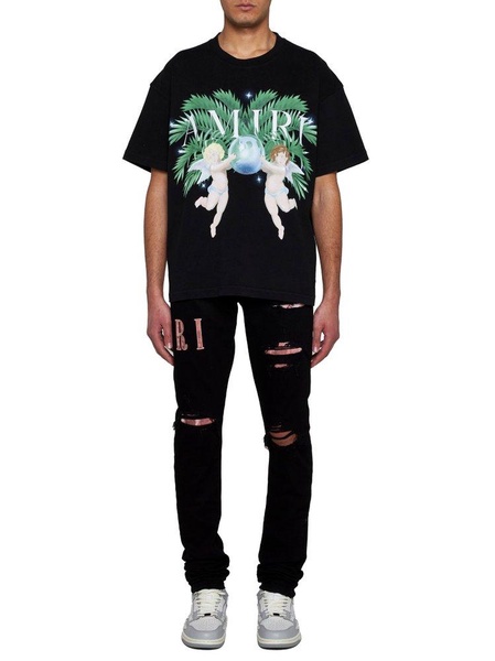 Amiri Logo Patch Distressed Skinny Jeans