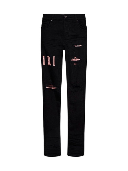 Amiri Logo Patch Distressed Skinny Jeans