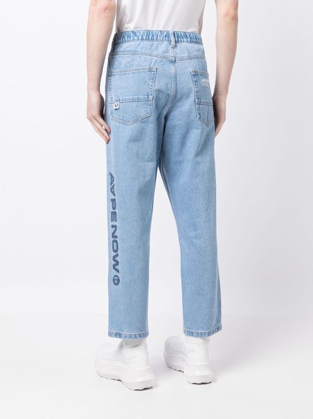 loose-fit patch-detail denim trousers