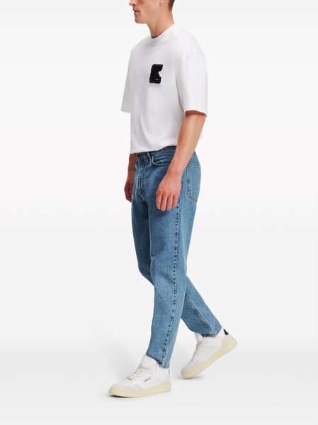 mid-rise tapered jeans 