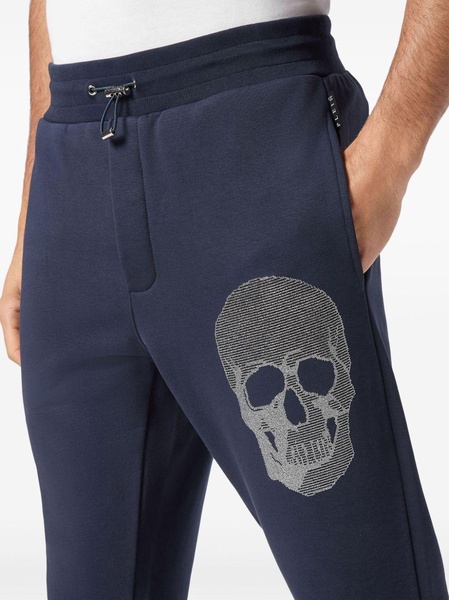 skull-embellished track pants