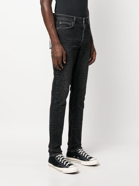 text-print mid-rise tapered jeans