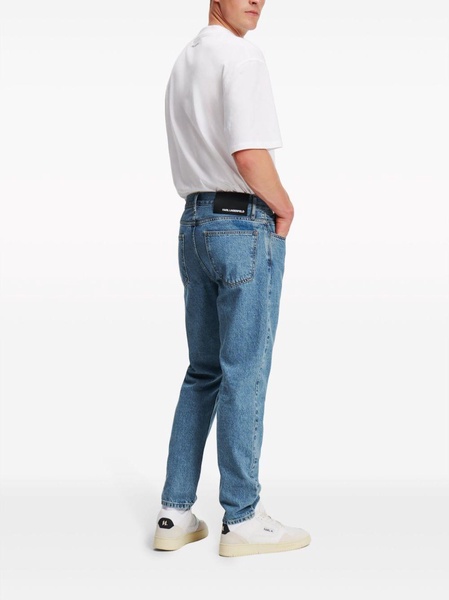 mid-rise tapered jeans 