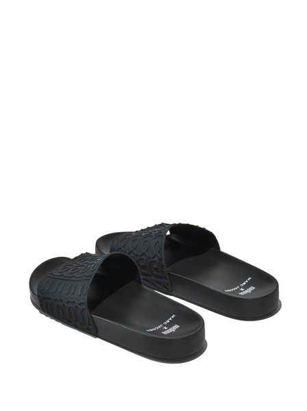 x Melissa logo-embossed slides