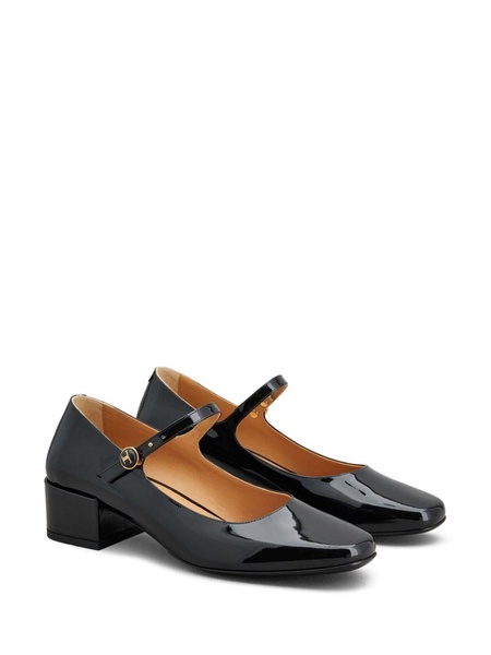 TOD'S Elegant Black Leather Pumps with Gold-Tone Accents