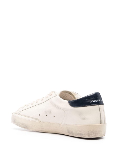 'Super-Star' White Low Top Sneakers with Embossed Logo and Contrasting Heel Tab in Leather Man