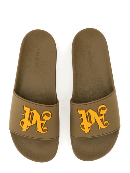 logo-embossed rubber slides