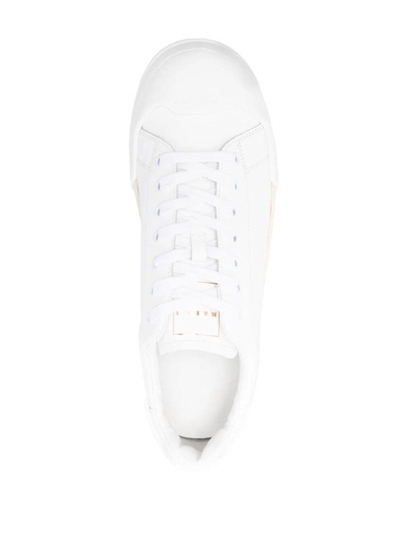 logo-debossed tonal leather sneakers 