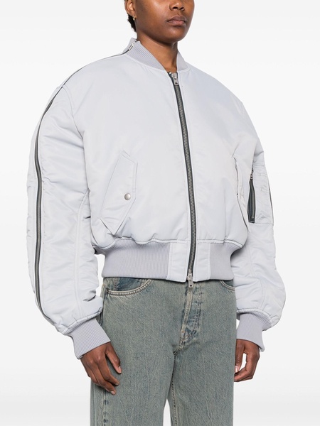 blue zipped padded bomber jacket