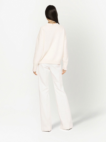 high-waisted flared trousers