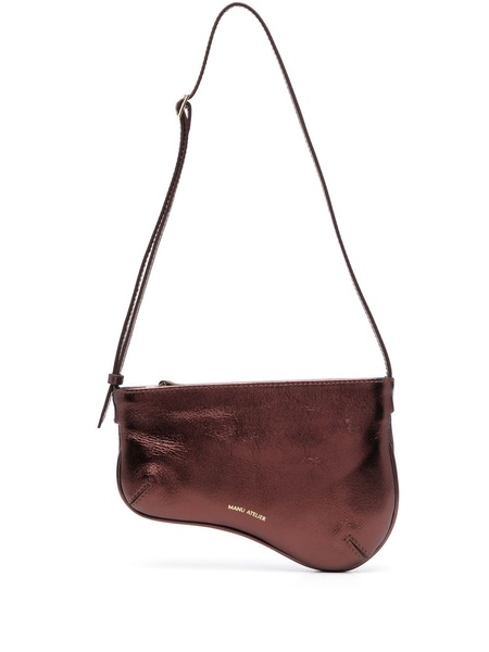 Curved metallic shoulder bag