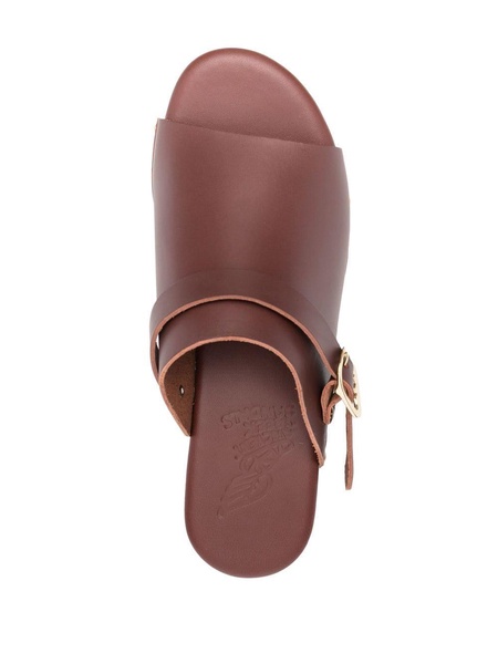 buckled leather clogs