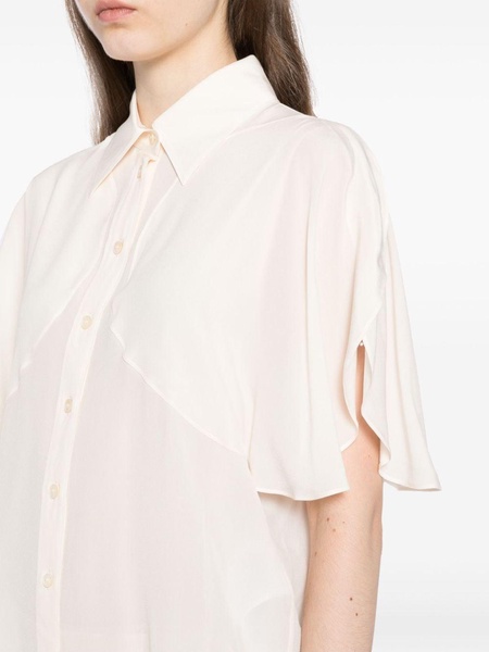 buttoned-up silk shirt