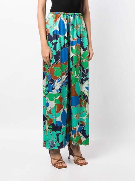 Alaia floral-print trousers