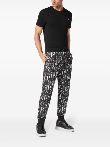 all-over logo-print track pants