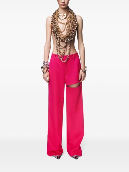 Asymmetric slit trousers