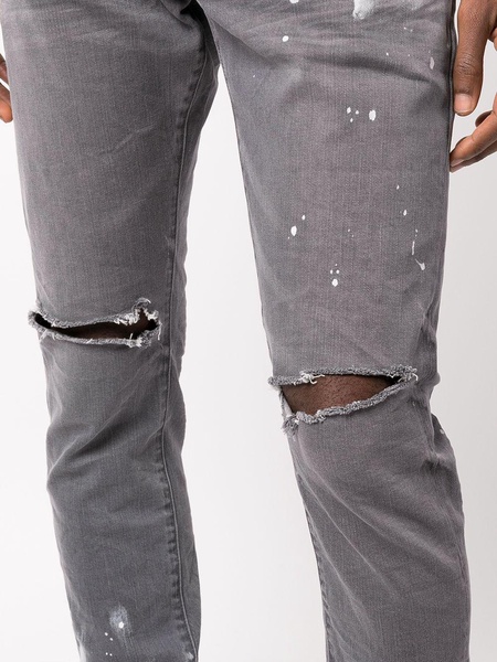 distressed paint-splatter slim fit jeans