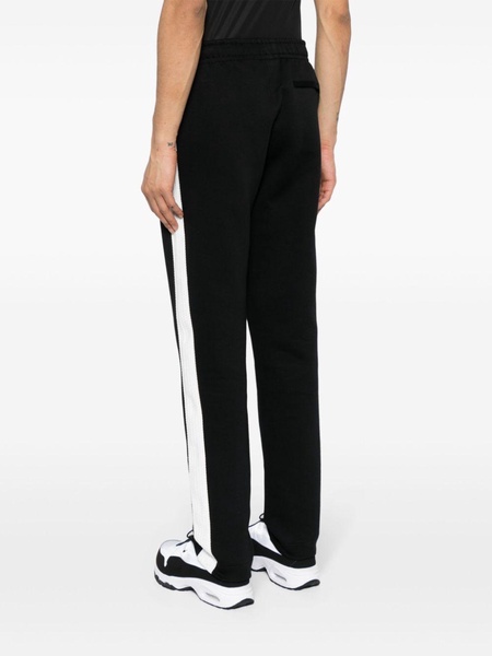 crocodile-appliqué track pants