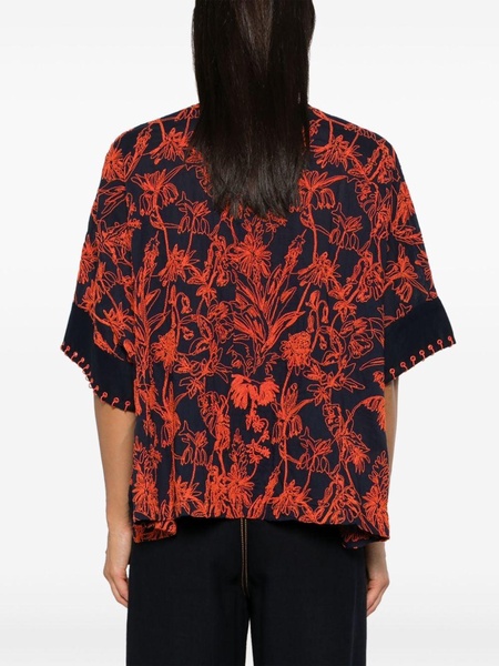 floral-embroidered top