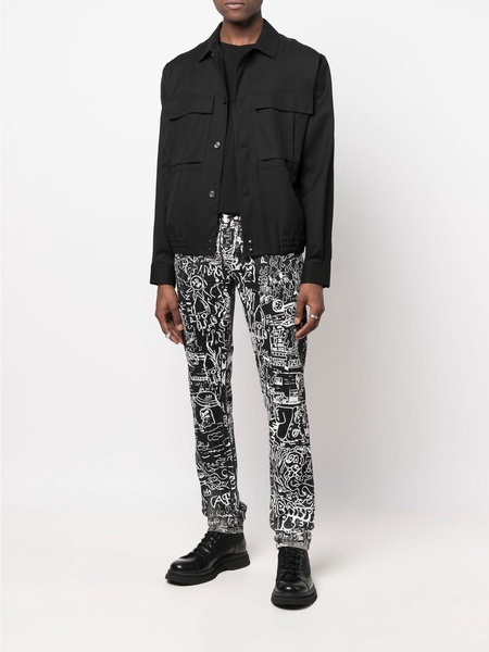 all-over graphic-print jeans