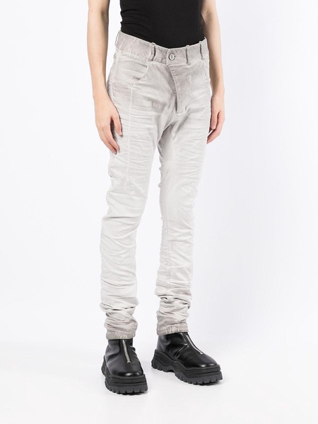 distressed-finish skinny-cut jeans