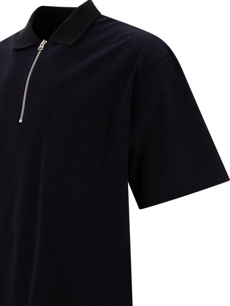 zip-up polo shirt