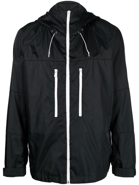 zipped-up hooded windbreaker