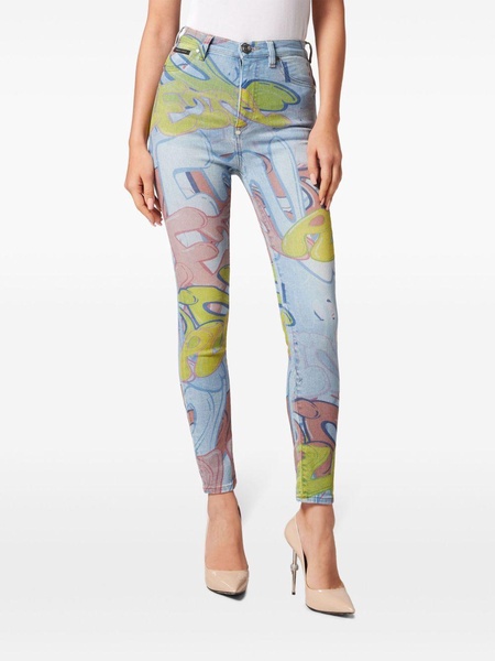 Bombing graffiti-print skinny jeans