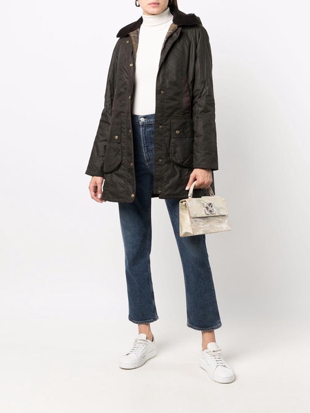 wax-coated buttoned-up coat