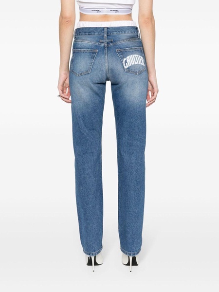 washed tapered jeans