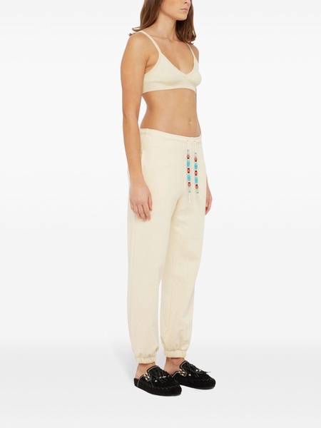 bead-embellished tapered trousers