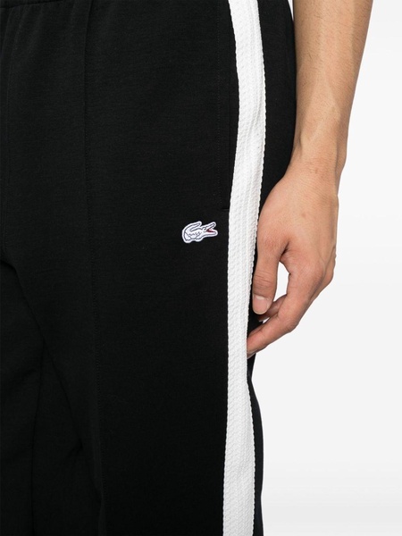 crocodile-appliqué track pants